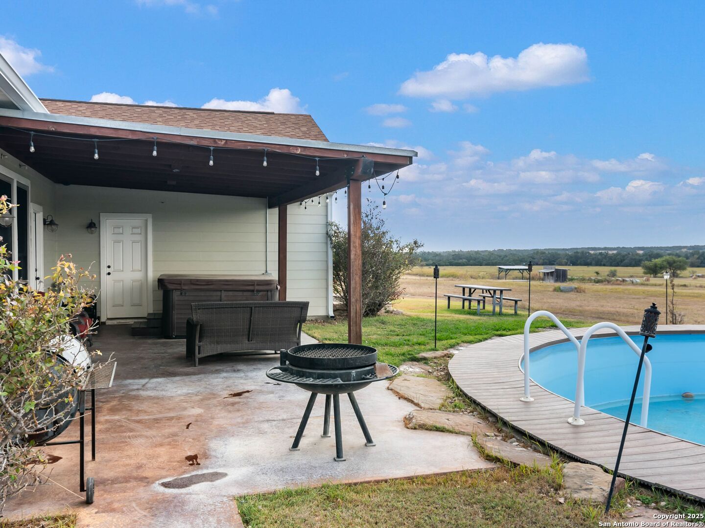 272 Schaper Road Fredericksburg, TX 78624 - Photo 36 of 62 a garden view with a seating space