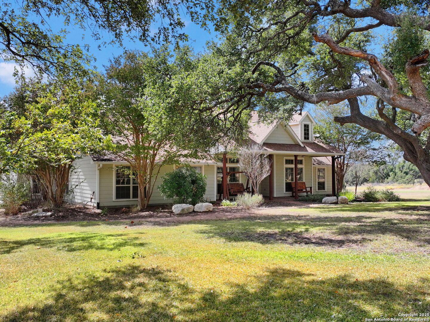 272 Schaper Road Fredericksburg, TX 78624 - Photo 4 of 62 a house with swimming pool in front of it