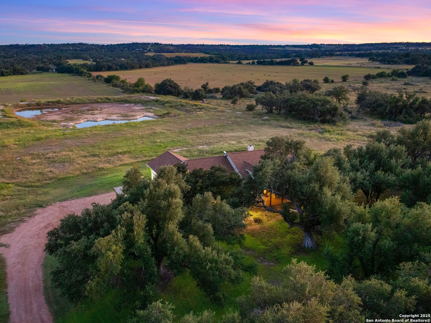 272 Schaper Road Fredericksburg, TX 78624 - Photo 43 of 62 a view of a lake in middle of the town