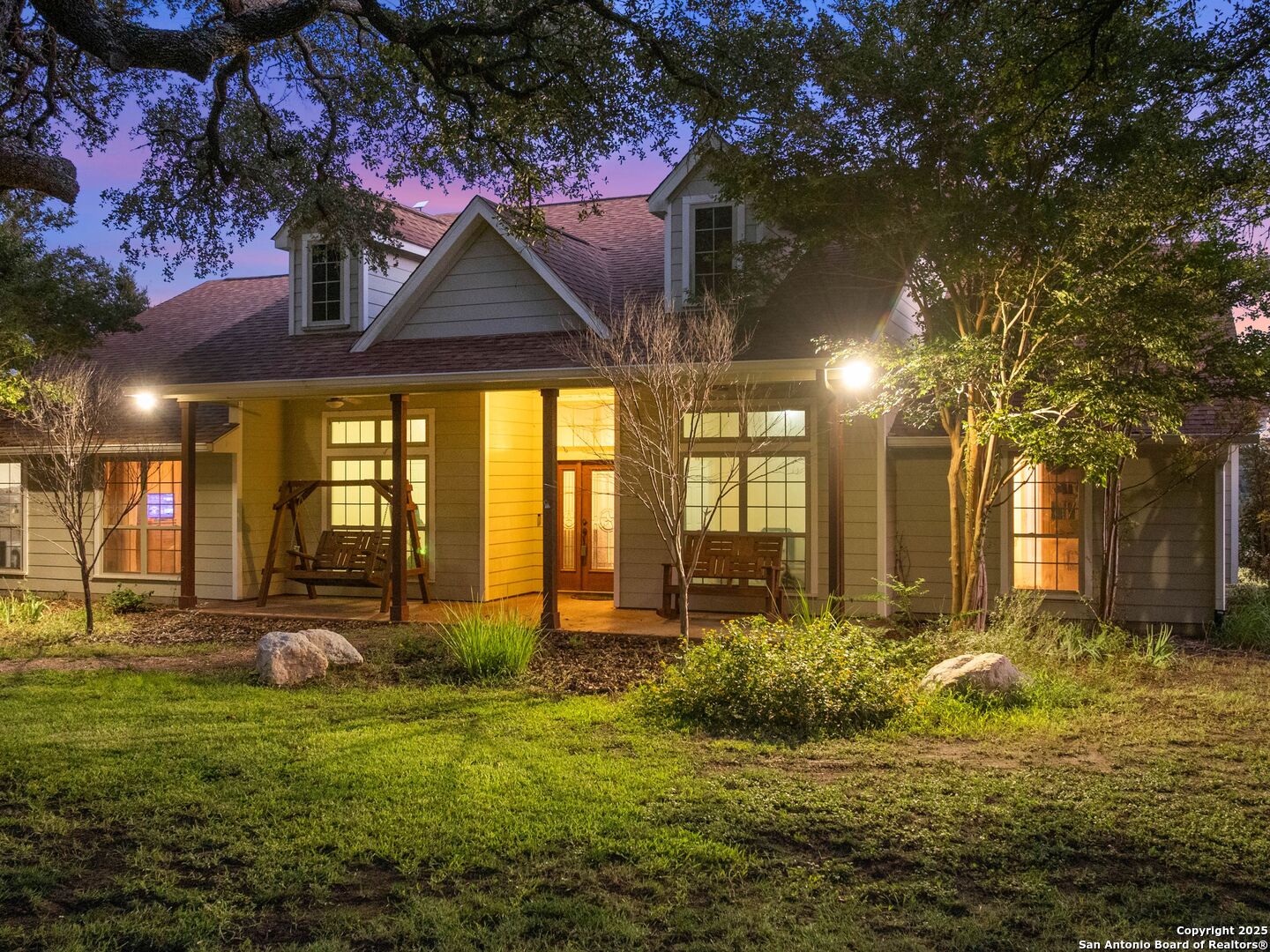 272 Schaper Road Fredericksburg, TX 78624 - Photo 44 of 62 a view of a house with a large tree and a yard
