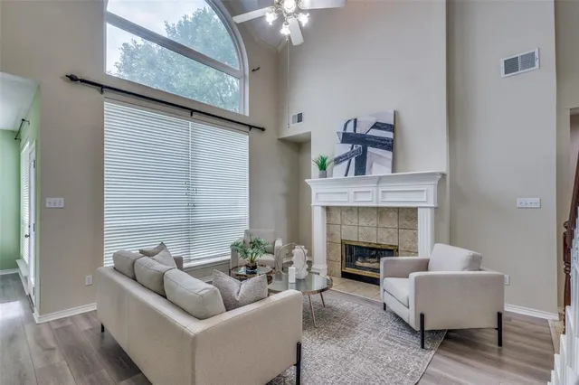a workspace room with furniture and wooden floor