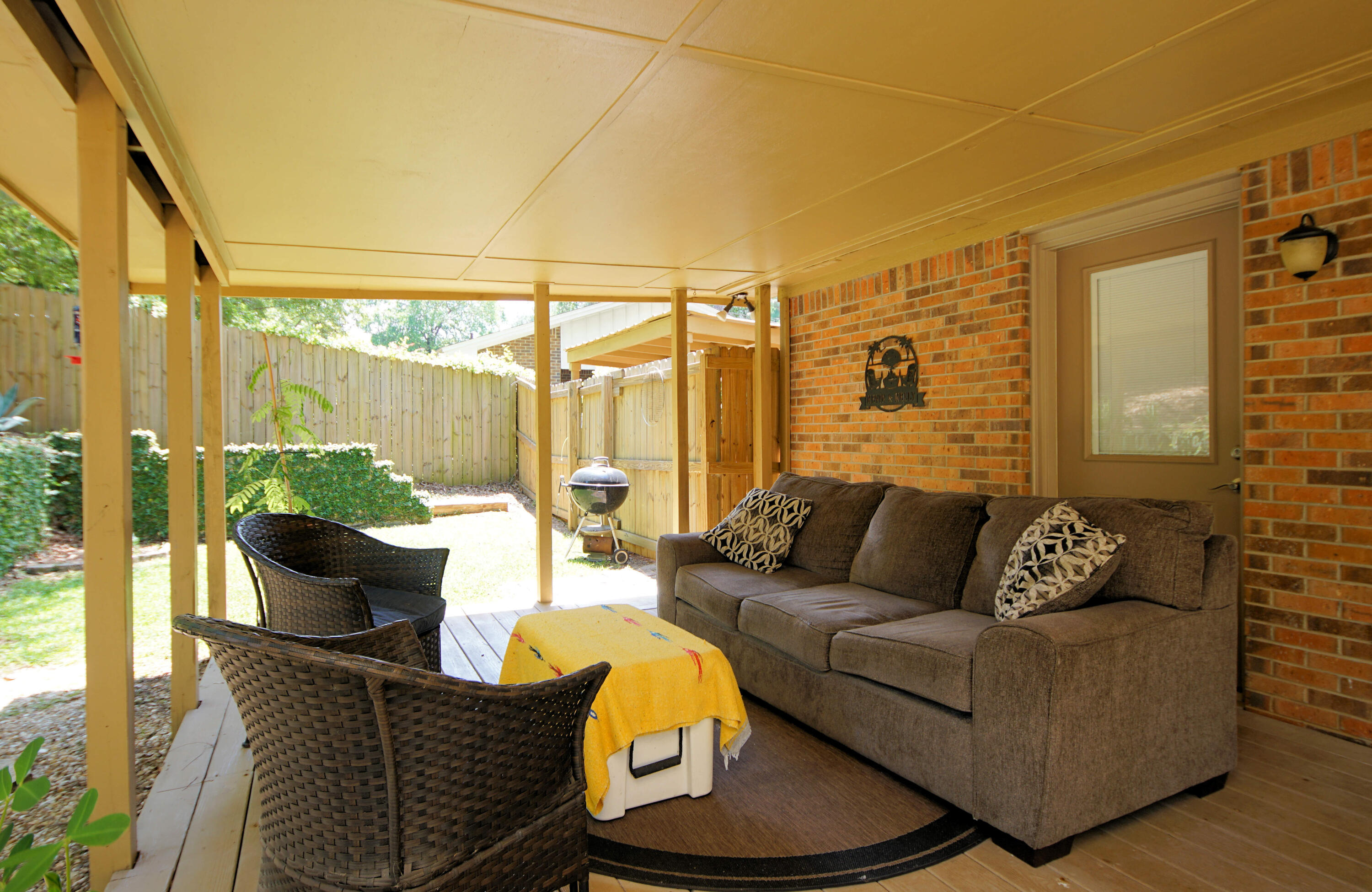 250 Panama Drive Crestview, FL 32536 - Photo 19 of 20 a outdoor living space with furniture and a potted plant