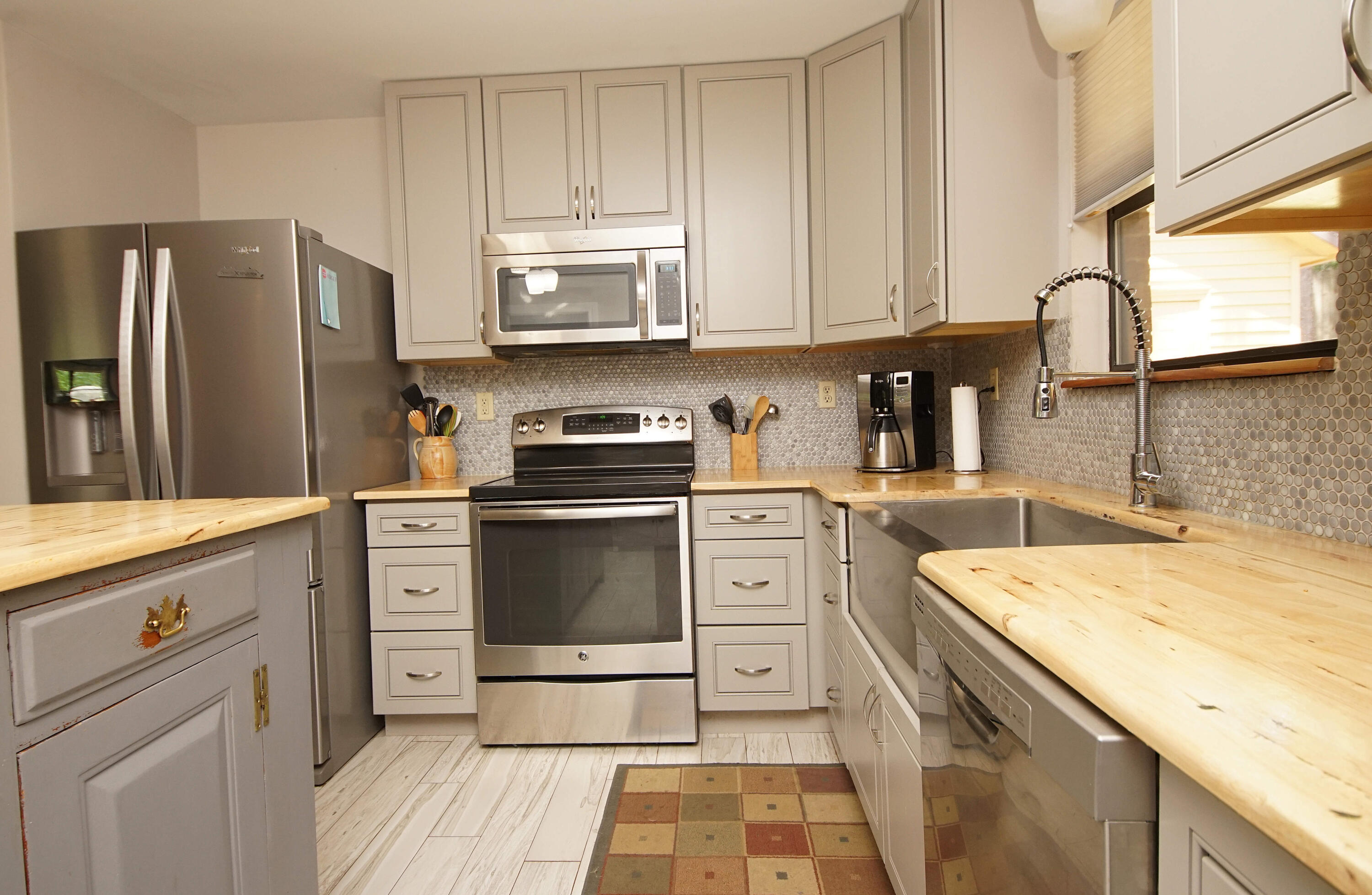 250 Panama Drive Crestview, FL 32536 - Photo 5 of 20 a kitchen with a refrigerator stove and sink