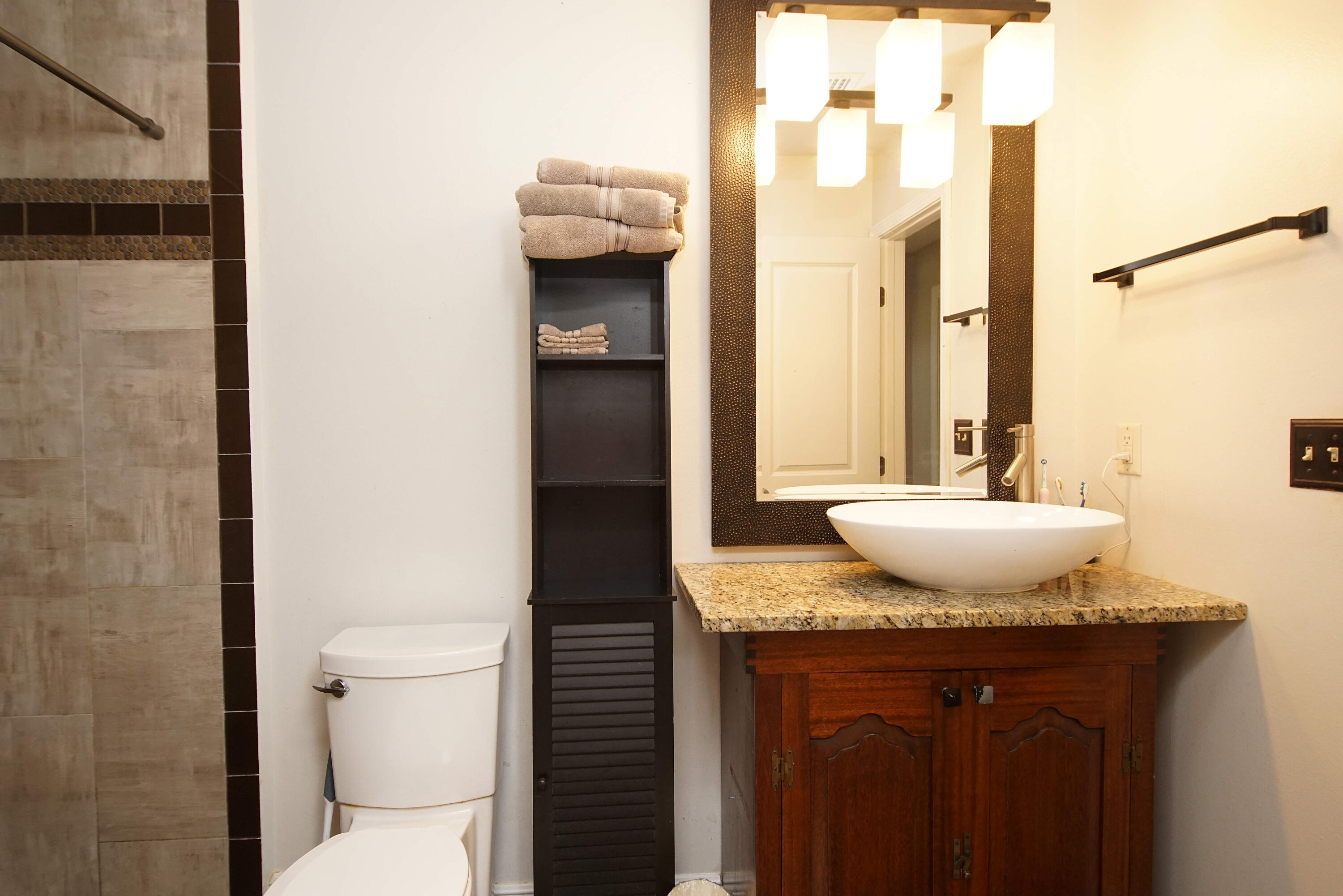 250 Panama Drive Crestview, FL 32536 - Photo 8 of 20 a bathroom with a granite countertop sink and a mirror