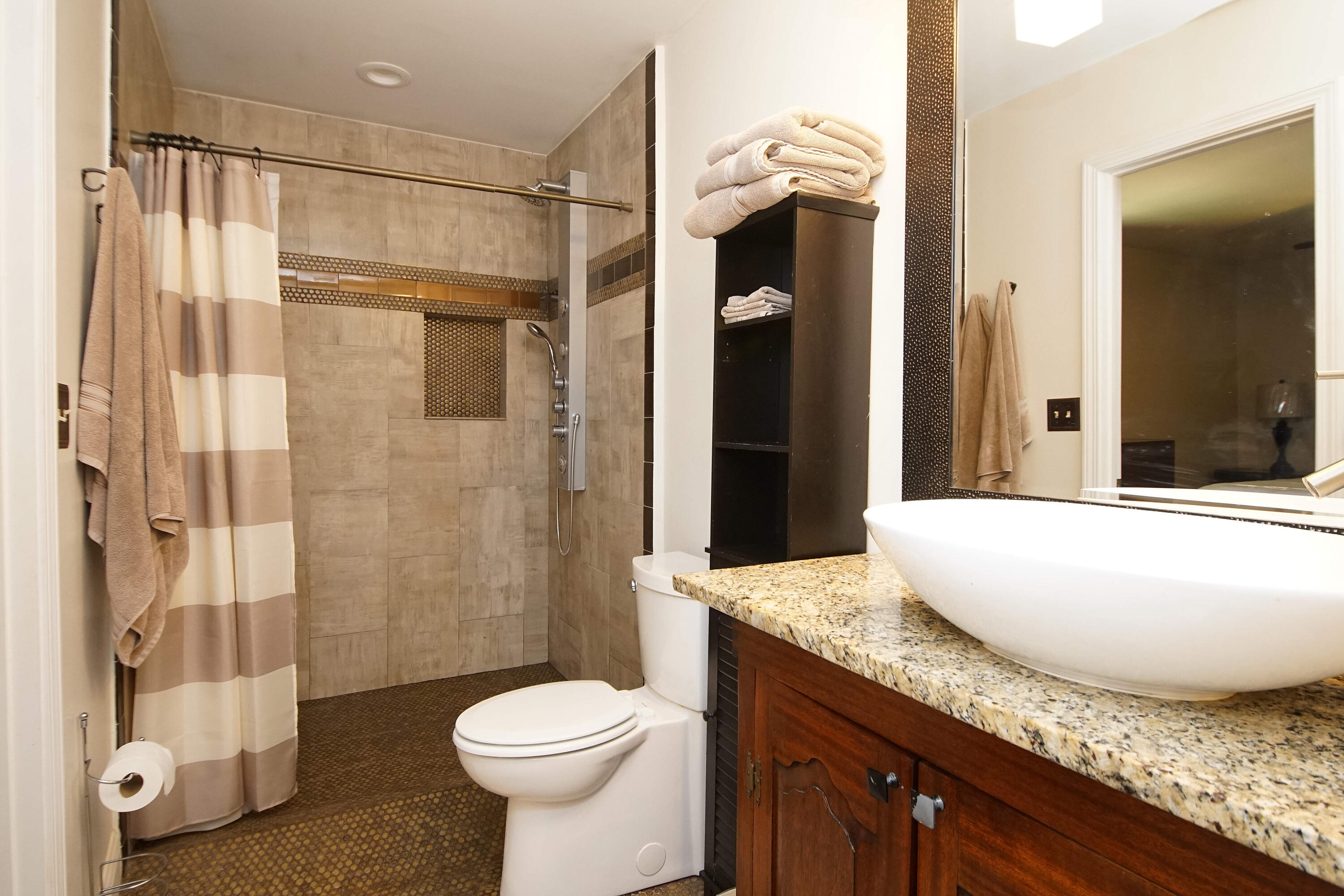 250 Panama Drive Crestview, FL 32536 - Photo 9 of 20 a bathroom with a granite countertop sink toilet and shower