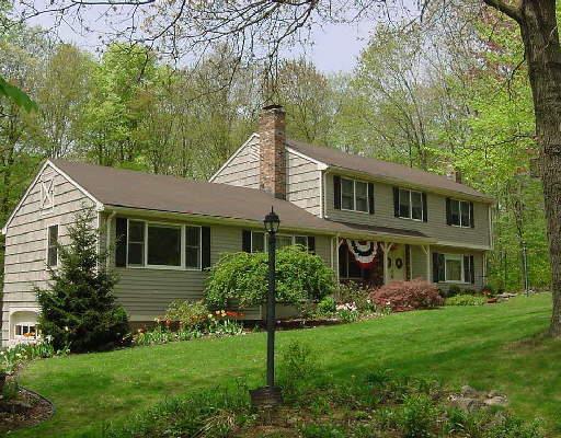 20 Lynnbrook Road Trumbull, CT 06611 - Photo 1 of 1 a front view of a house with a yard