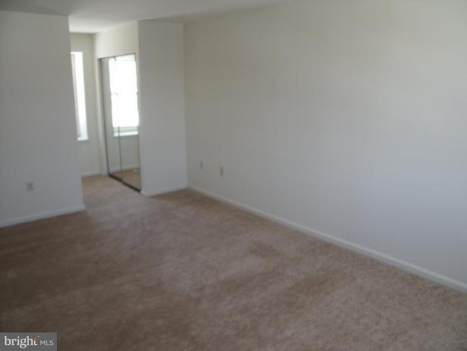 2963 Gracefield Road Silver Spring, MD 20904 - Photo 11 of 30 an empty room with windows
