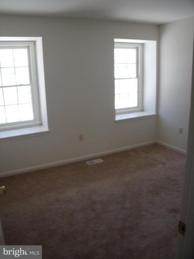 2963 Gracefield Road Silver Spring, MD 20904 - Photo 14 of 30 an empty room with a window