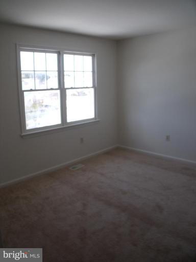 2963 Gracefield Road Silver Spring, MD 20904 - Photo 17 of 30 an empty room with a window