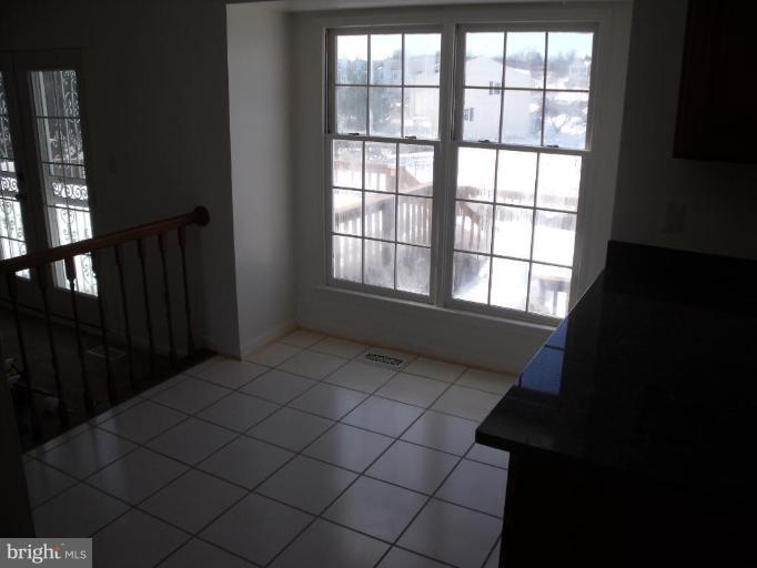 2963 Gracefield Road Silver Spring, MD 20904 - Photo 29 of 30 a view of an empty room and window