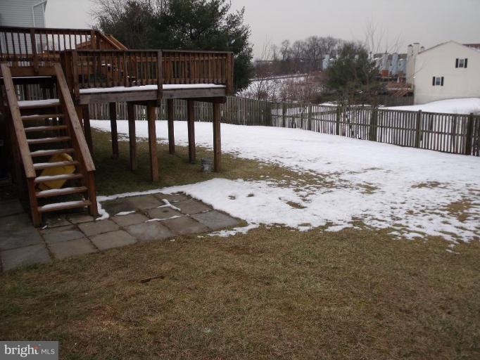 2963 Gracefield Road Silver Spring, MD 20904 - Photo 4 of 30 a view of backyard with wooden fence and trees