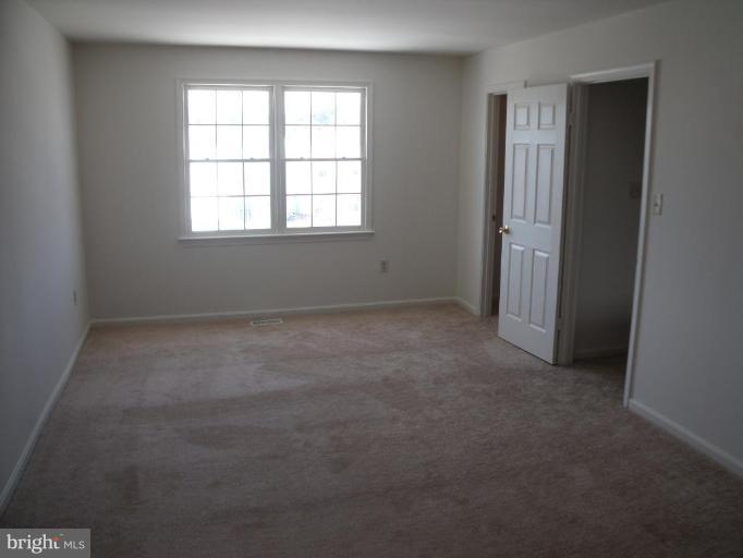 2963 Gracefield Road Silver Spring, MD 20904 - Photo 9 of 30 an empty room with windows