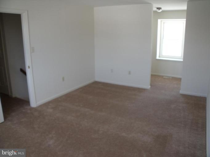 2963 Gracefield Road Silver Spring, MD 20904 - Photo 10 of 30 an empty room with a window