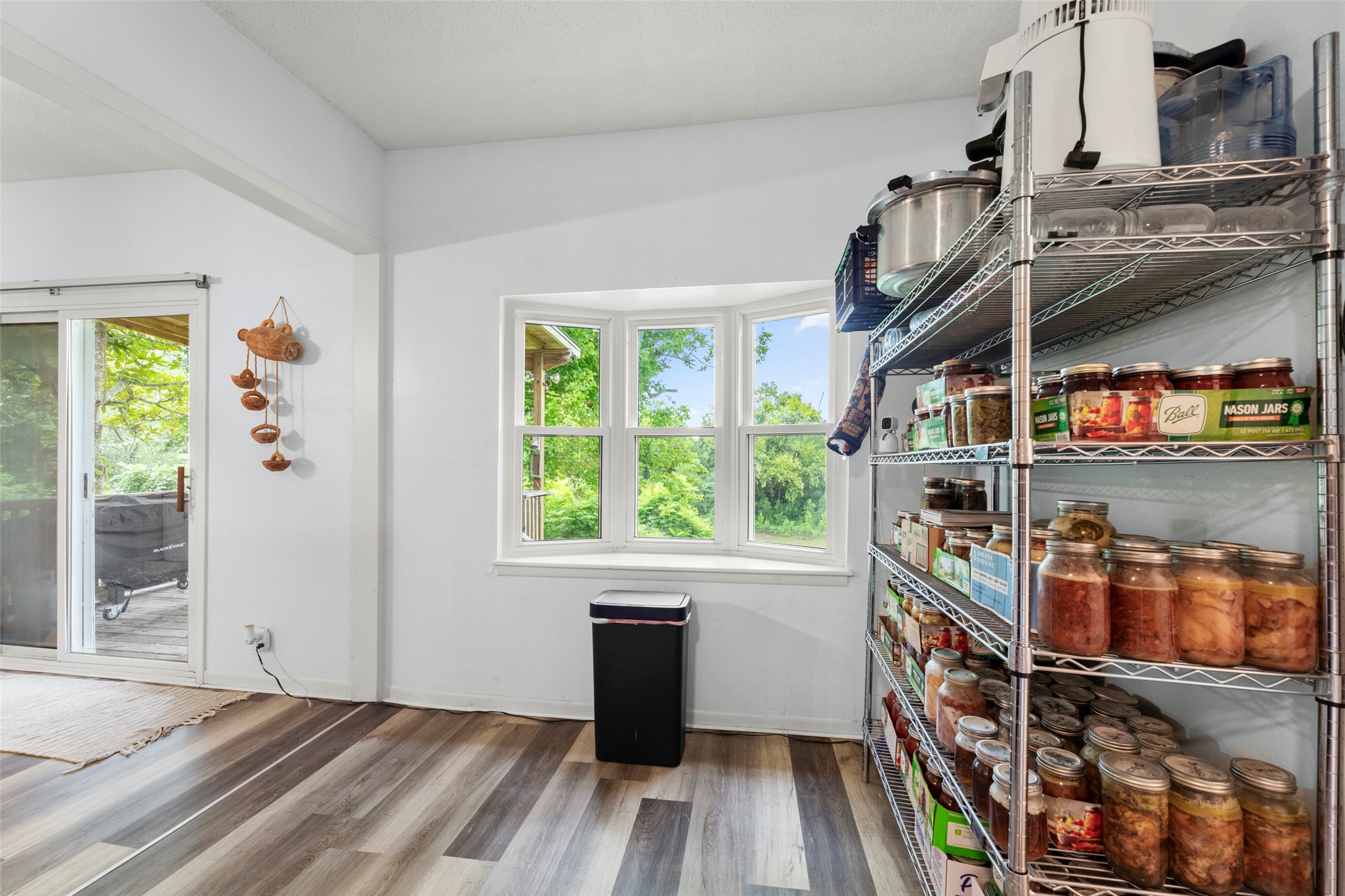 703 Pecan Valley Road Wharton, TX 77488 - Photo 13 of 47 There's plenty of room in this kitchen to put a cozy breakfast set and enjoy the river views while you enjoy your morning coffee.