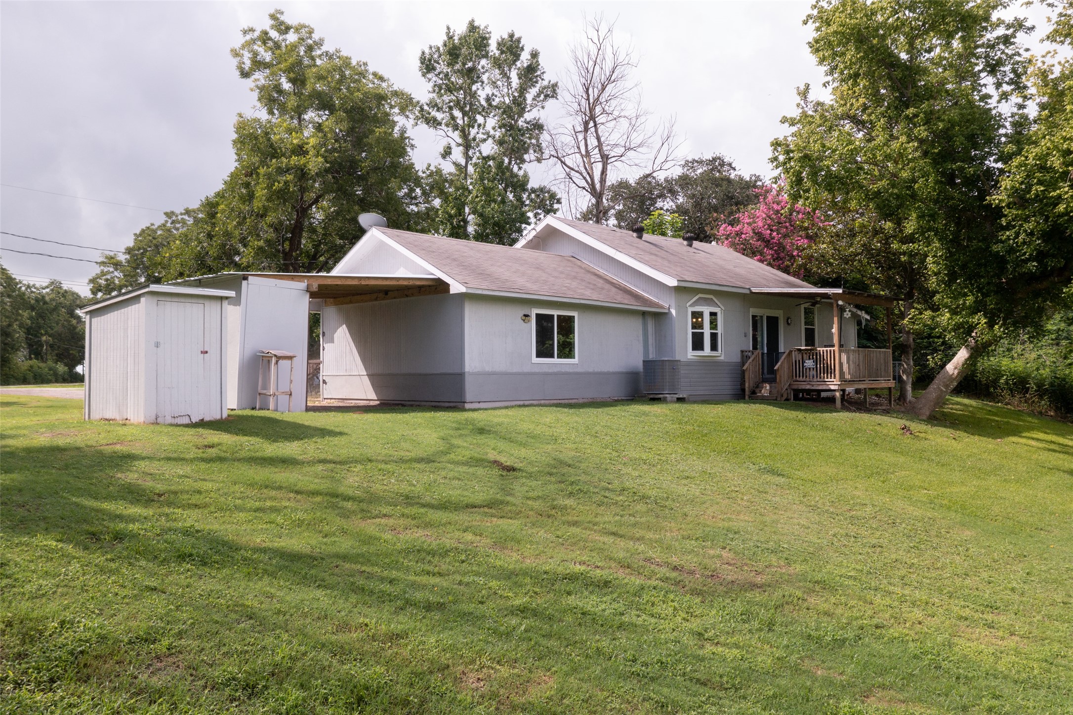703 Pecan Valley Road Wharton, TX 77488 - Photo 2 of 47 Check out this awesome back yard! This property offers endless possibilities for you and your family to enjoy riverfront living!