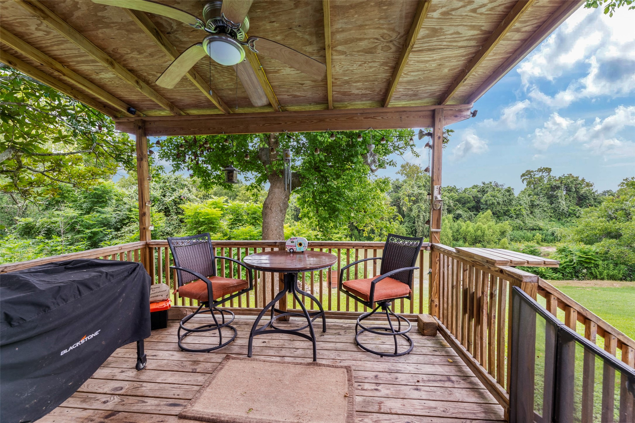 703 Pecan Valley Road Wharton, TX 77488 - Photo 26 of 47 Whether you're enjoying your morning coffee or your evening aperitif, this covered back porch will be your favorite spot to start or wind down you days. I hope you'll notice all the birds singing when you come tour this property! It's magic!