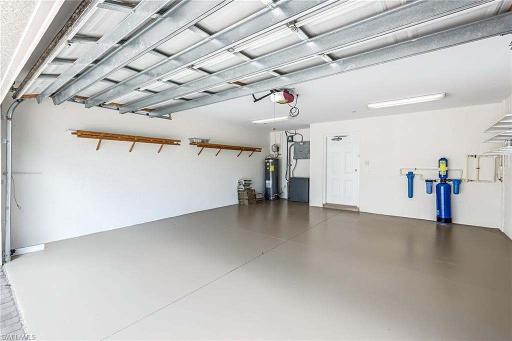510 Avellino Isles Circle, Unit 2202 Naples, FL 34119 - Photo 25 of 35 a view of a livingroom with furniture