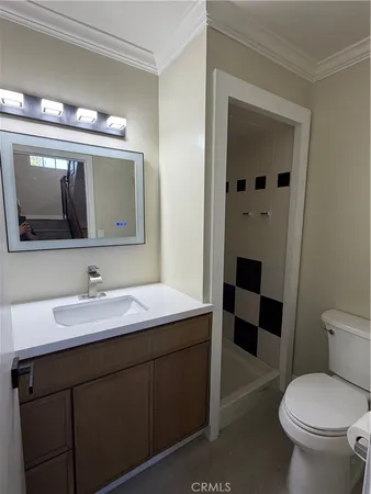a bathroom with a bathtub and a toilet