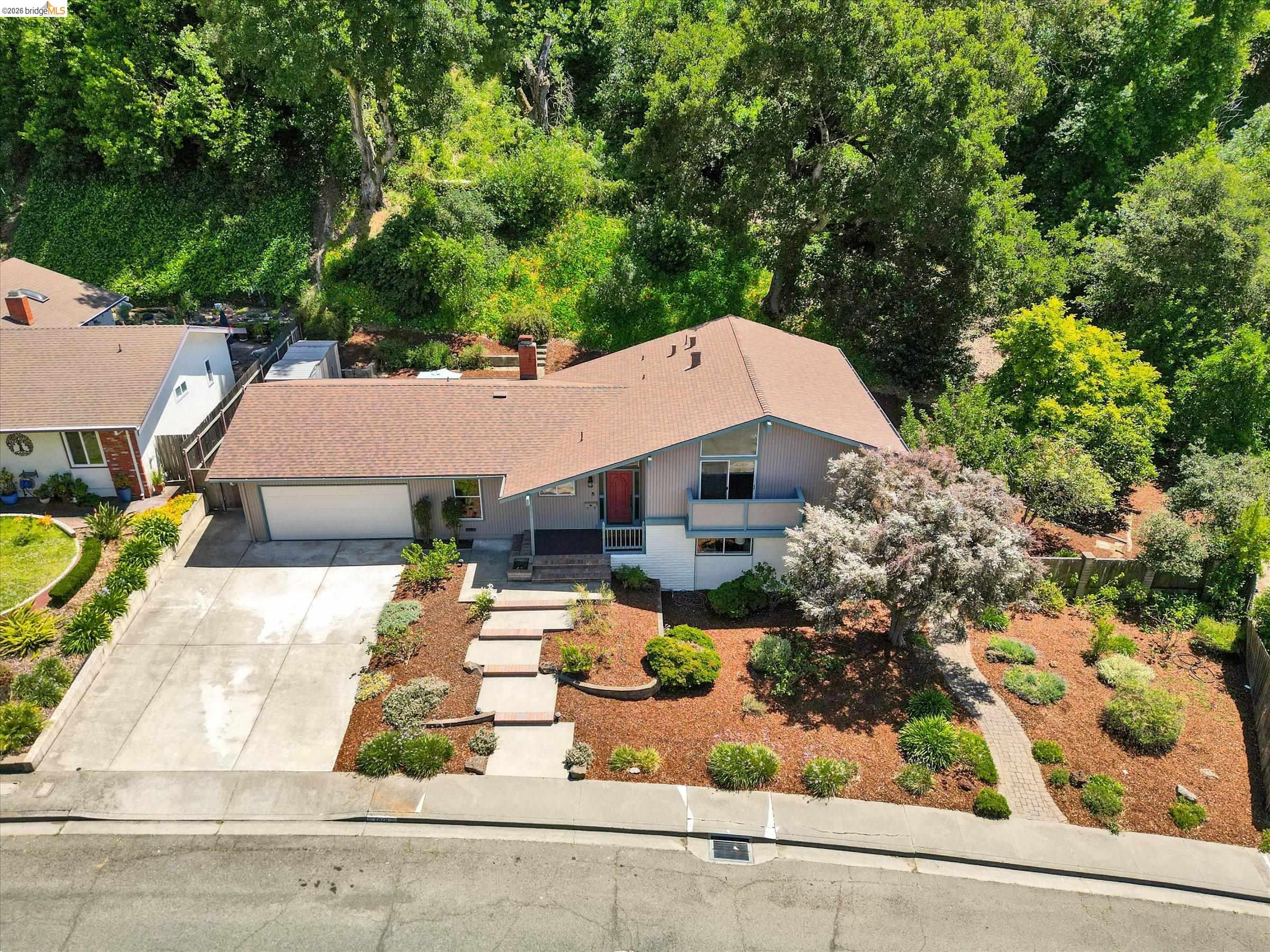 2826 Wright Avenue Pinole, CA 94564 - Photo 57 of 70 Contemporary single-story residence with a brown shingle roof and light gray siding