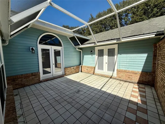 a kitchen with a sink cabinets and stainless steel appliances