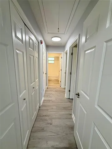 a view of empty room with lounge chair