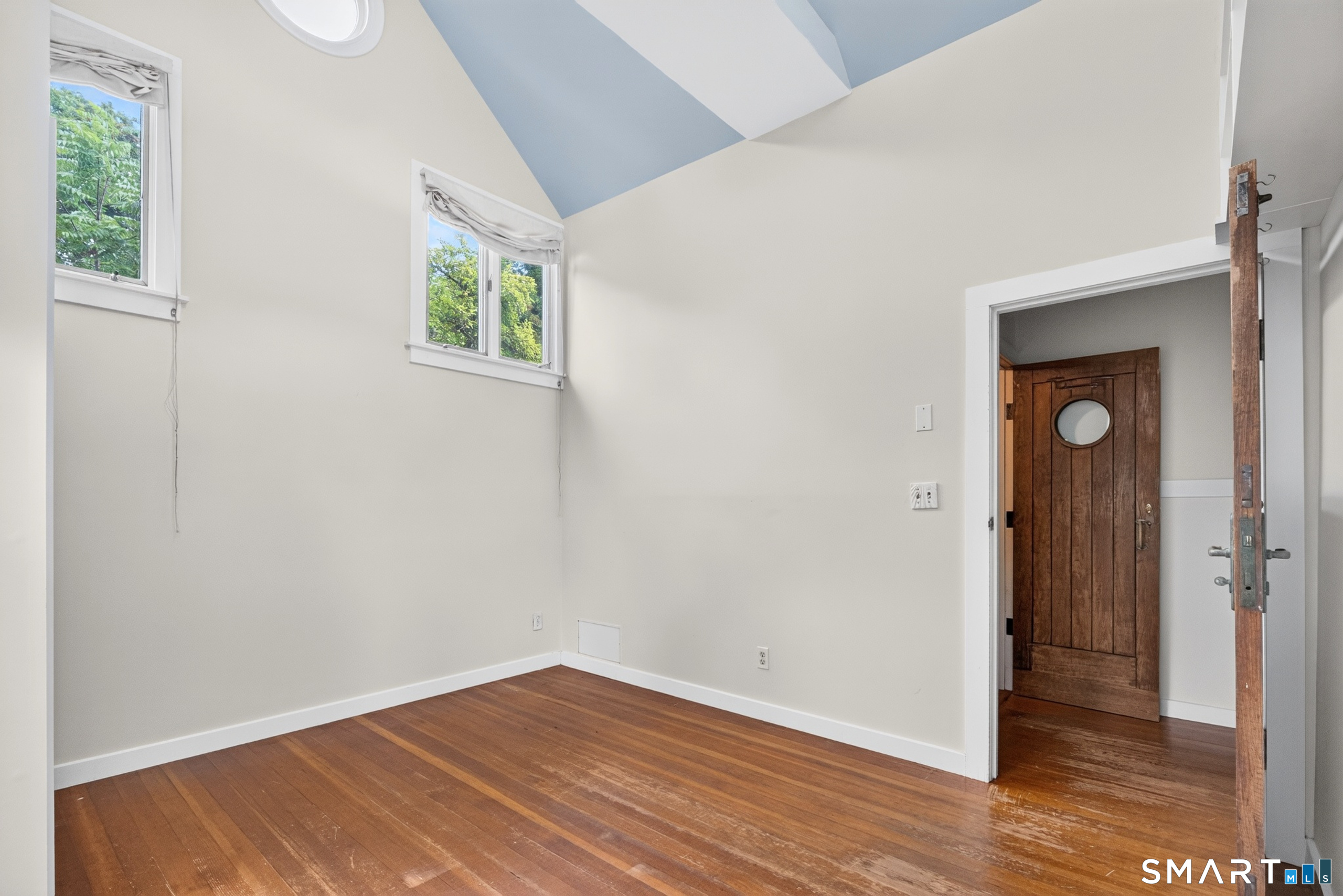 207 Pawson Road Branford, CT 06405 - Photo 25 of 39 Primary bedroom with high vaulted ceilings !