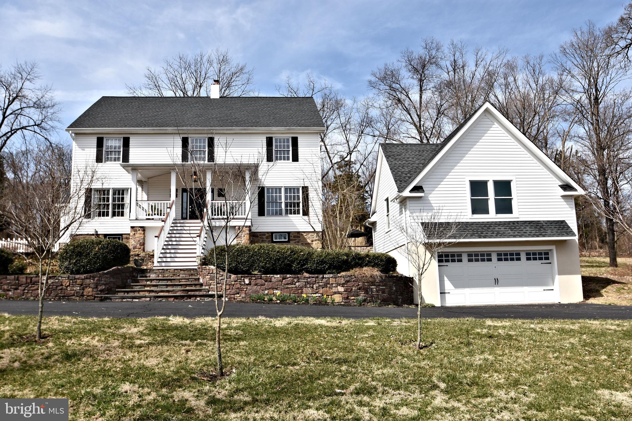312 Ferry Road Doylestown, PA 18901 - Photo 2 of 66 a front view of a house with a yard