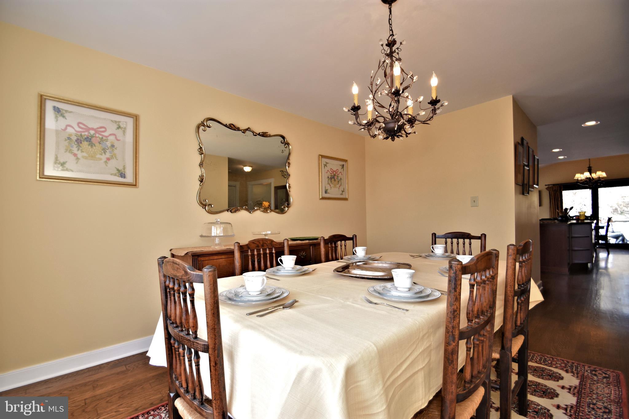 312 Ferry Road Doylestown, PA 18901 - Photo 13 of 66 a view of a dining room with furniture and wooden floor