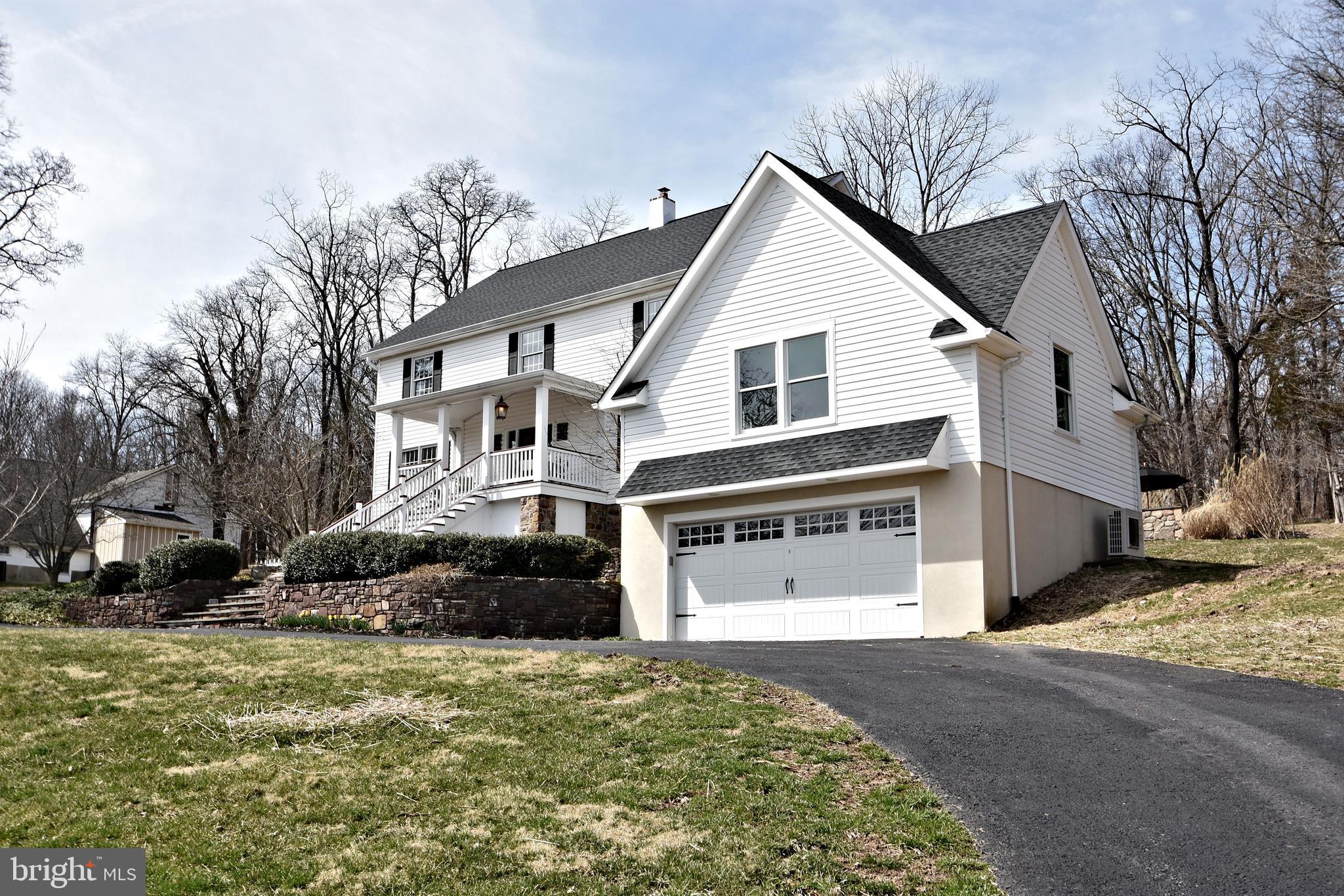 312 Ferry Road Doylestown, PA 18901 - Photo 3 of 66 a front view of a house with a yard