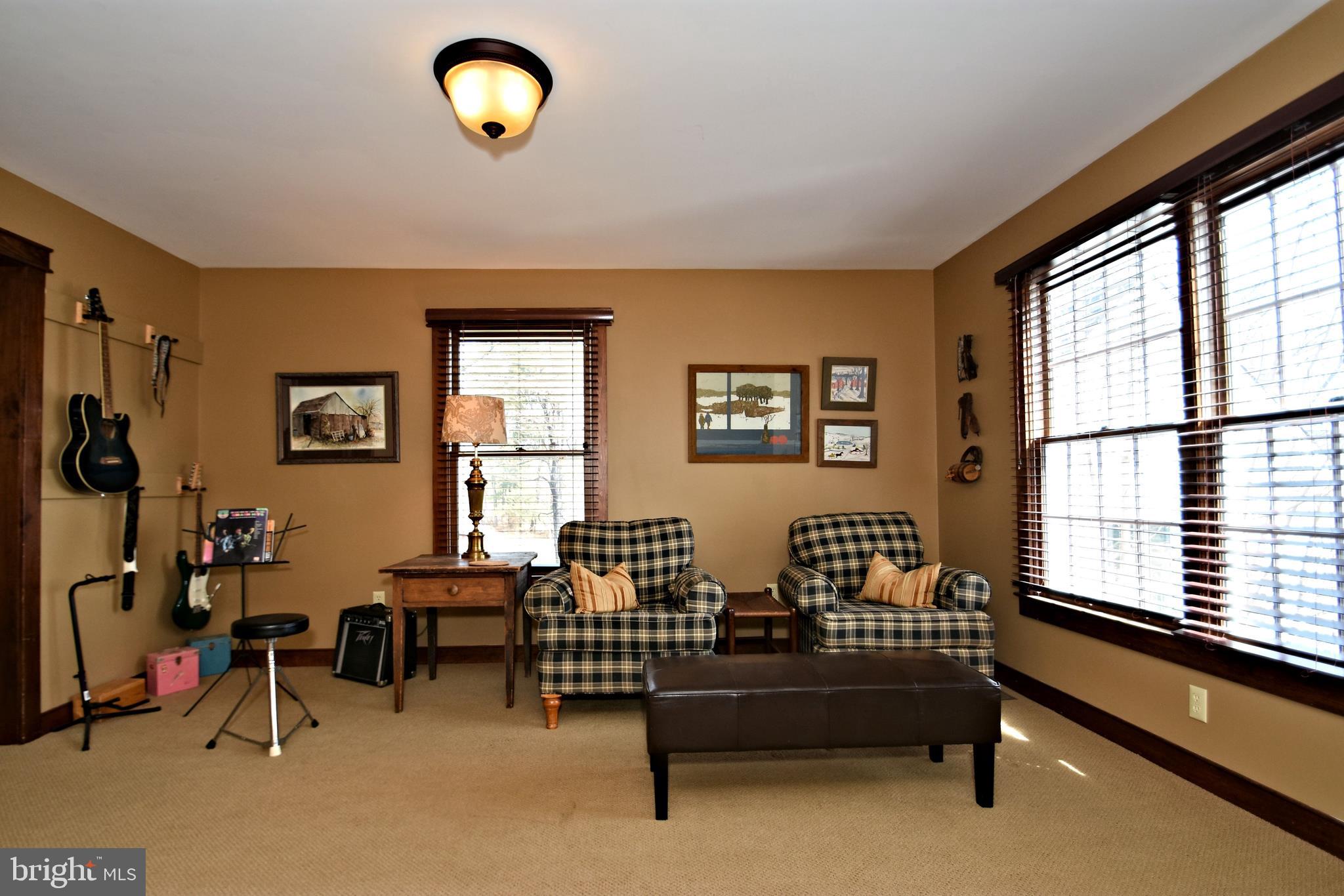 312 Ferry Road Doylestown, PA 18901 - Photo 24 of 66 a living room with furniture and a window