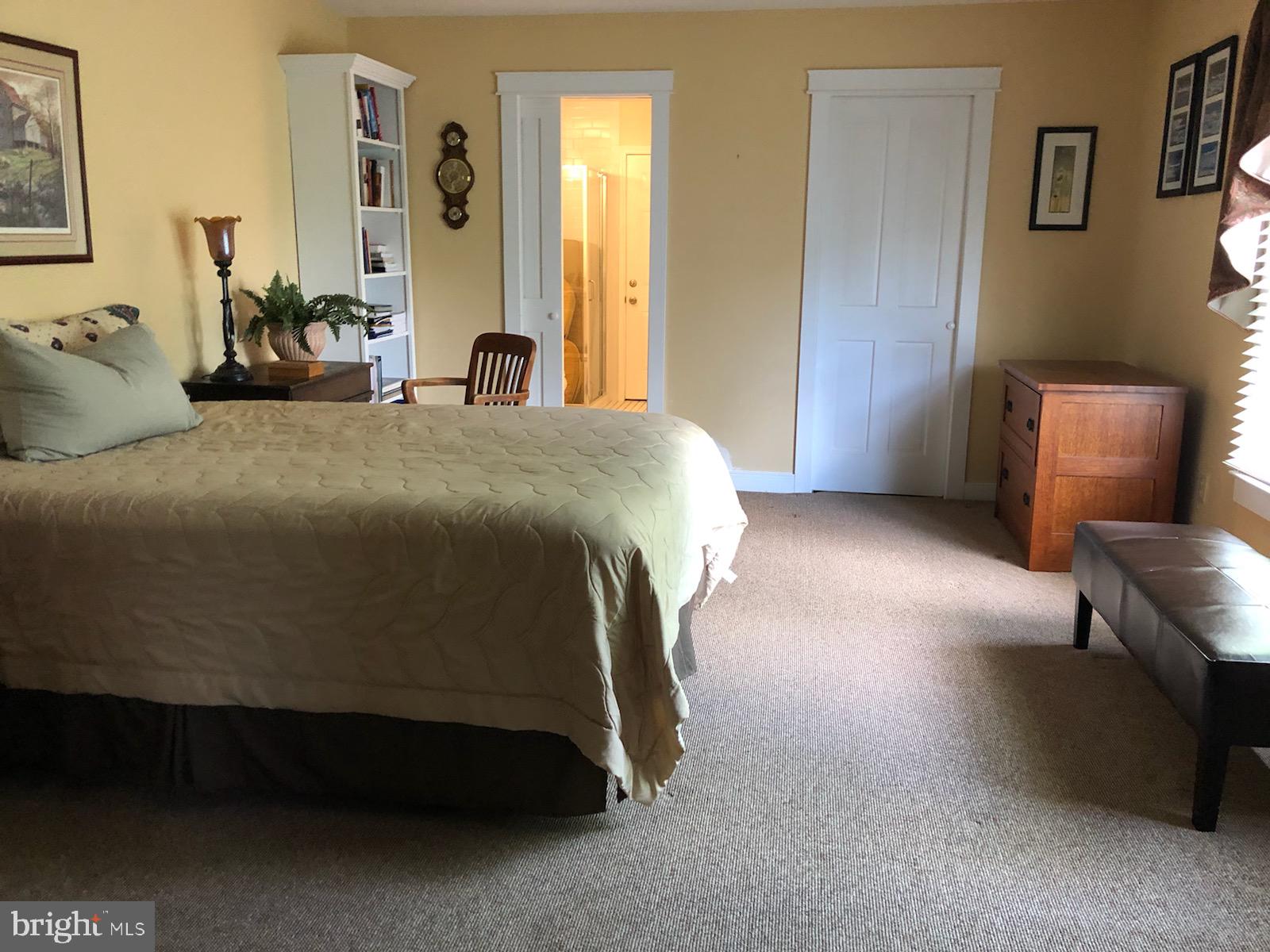 312 Ferry Road Doylestown, PA 18901 - Photo 26 of 66 a bedroom with a bed and wooden floor