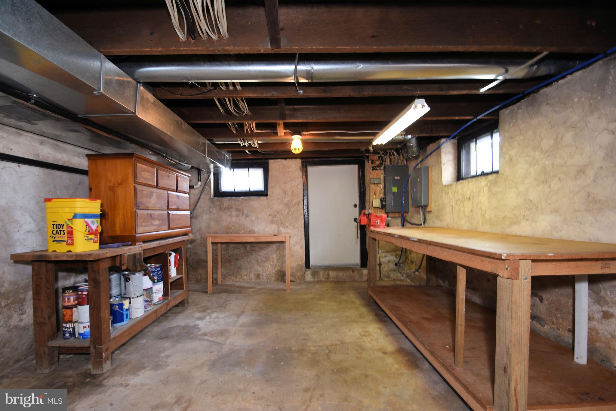 312 Ferry Road Doylestown, PA 18901 - Photo 50 of 66 a utility room with stainless steel appliances wooden cabinets and a sink