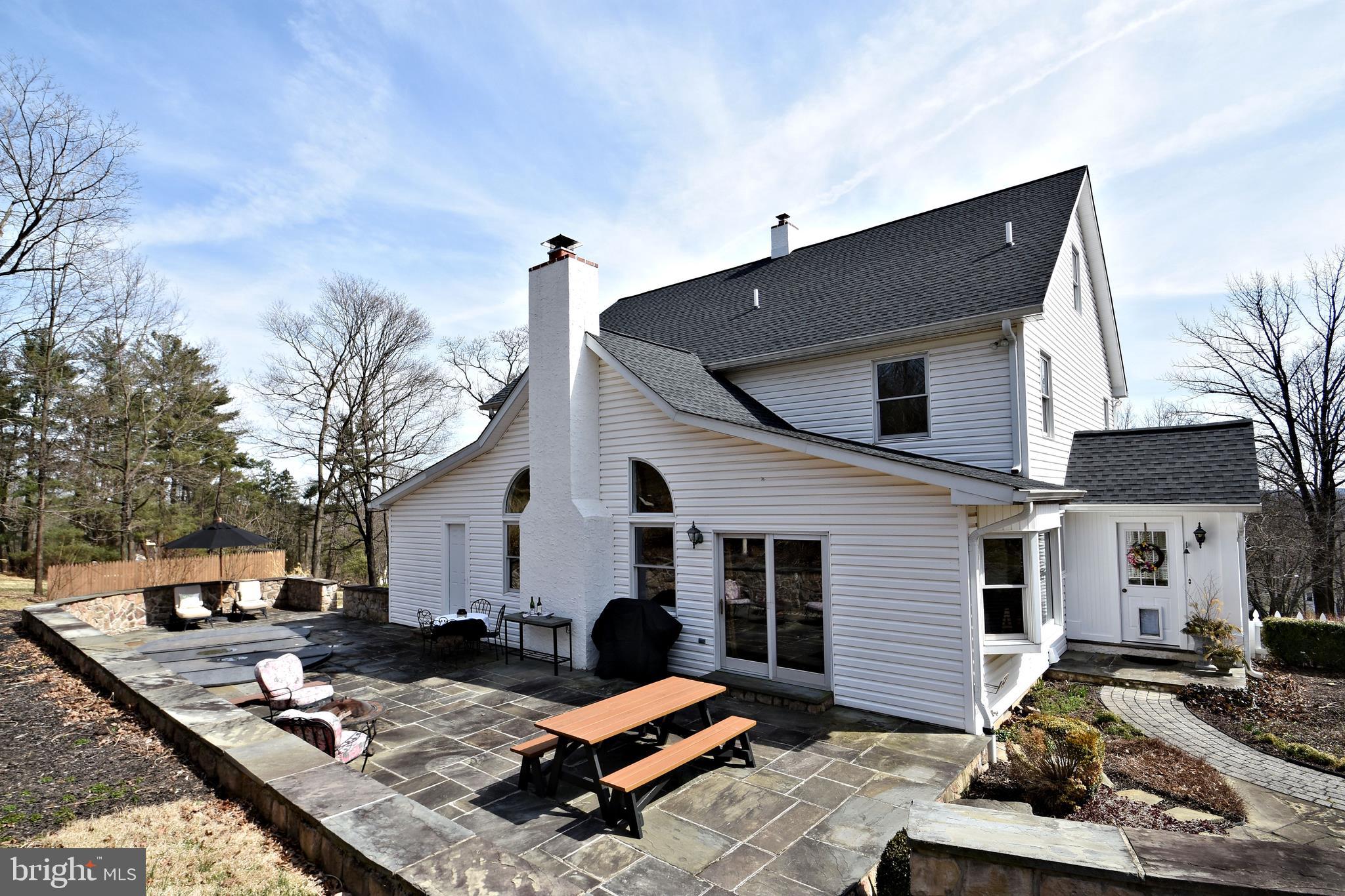312 Ferry Road Doylestown, PA 18901 - Photo 54 of 66 a house view with a sitting space fire pit and outdoor space