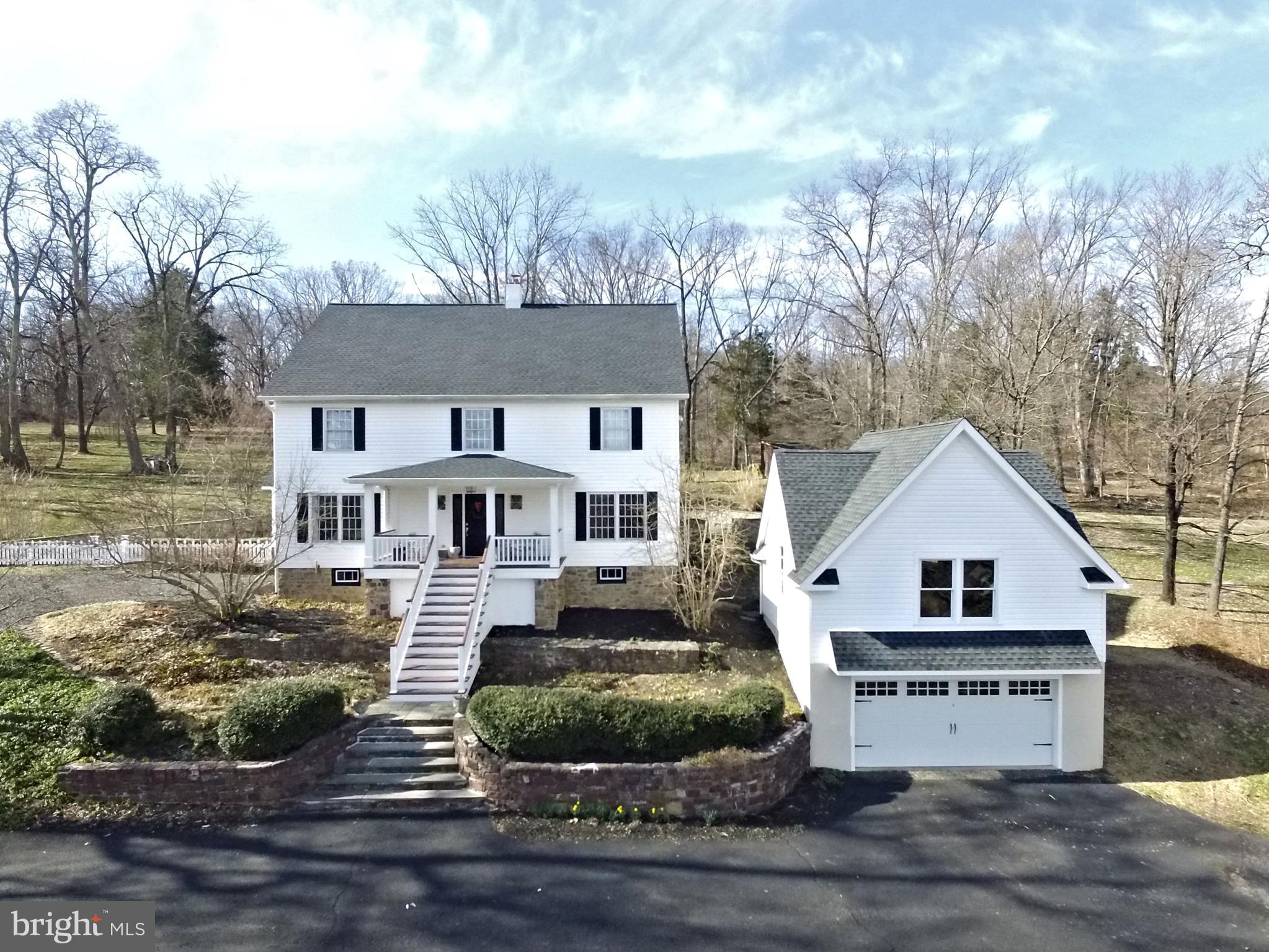 312 Ferry Road Doylestown, PA 18901 - Photo 60 of 66 a front view of a house with a yard