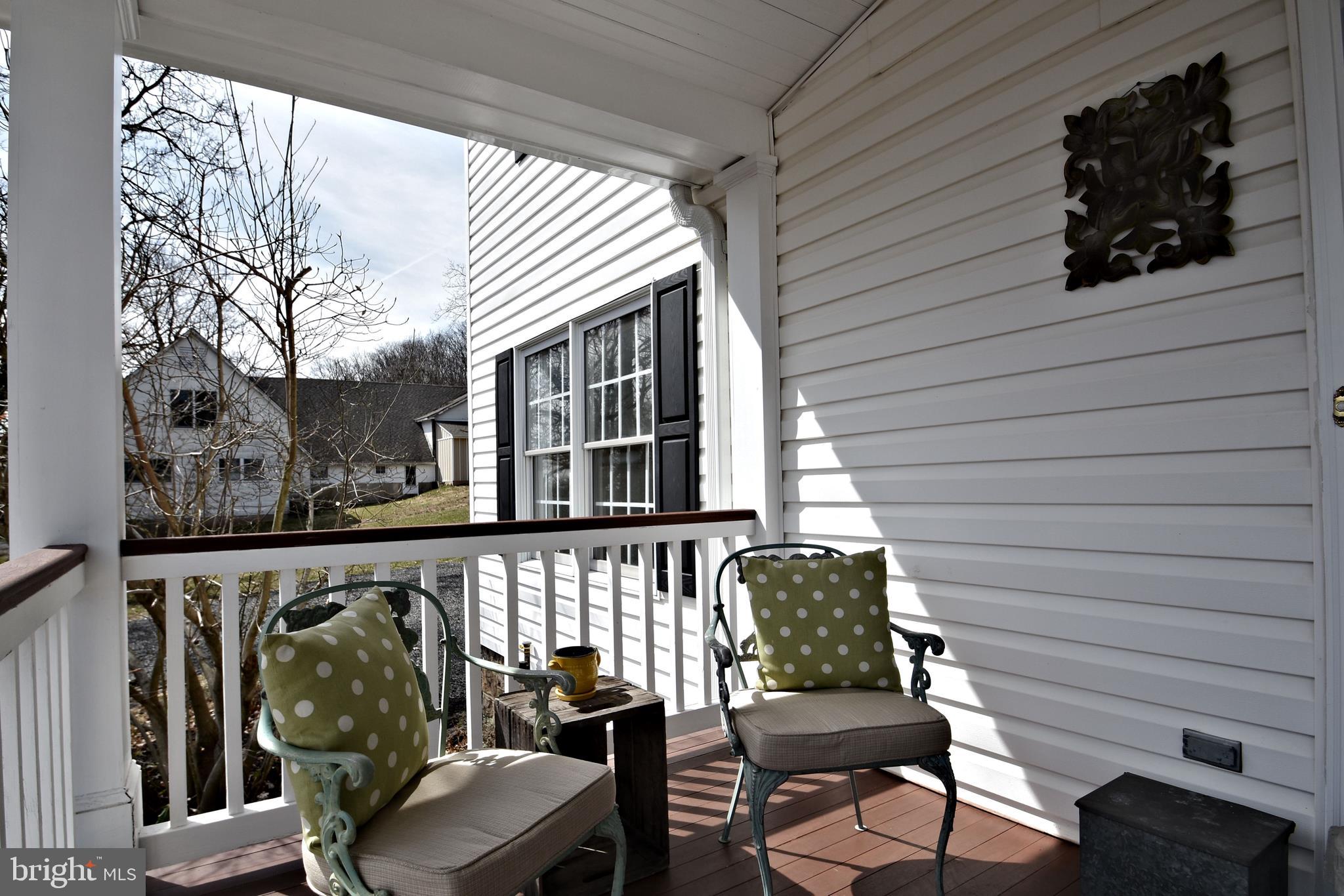 312 Ferry Road Doylestown, PA 18901 - Photo 64 of 66 a view of a chairs and table in a patio