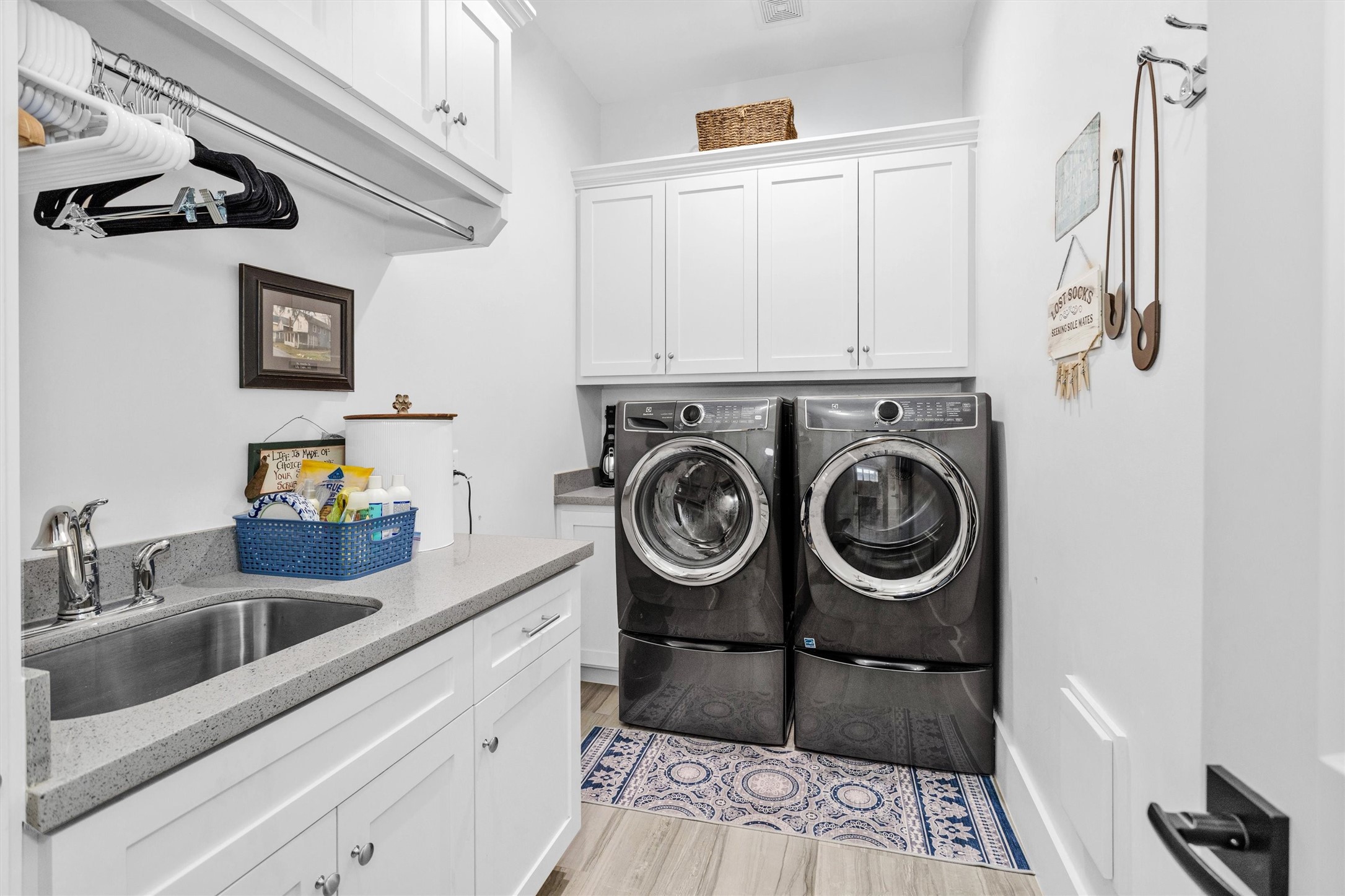 1202 Walton Street Houston, TX 77009 - Photo 11 of 32 Spacious Utility Room Featuring a Utility Sink, Abundant Storage, and Plenty of Space to Keep Everyday Essentials Organized