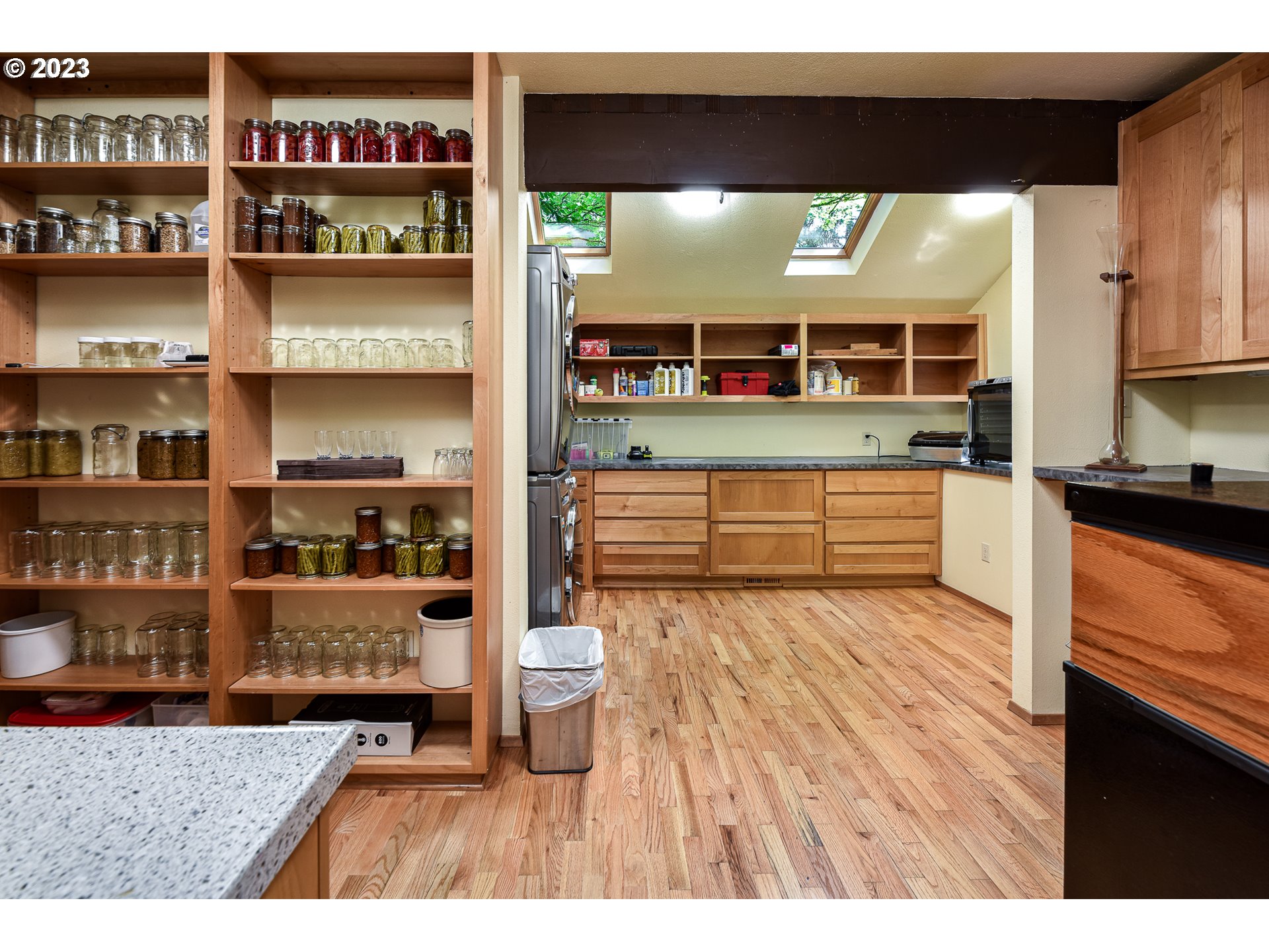 1878 Fircrest Drive Eugene, OR 97403 - Photo 26 of 38 a living room with furniture and a wooden floor