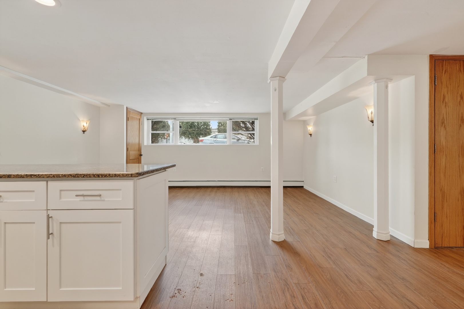 5101 North Kenton Avenue, Unit G Chicago, IL 60630 - Photo 11 of 25 a view of a kitchen with wooden floor