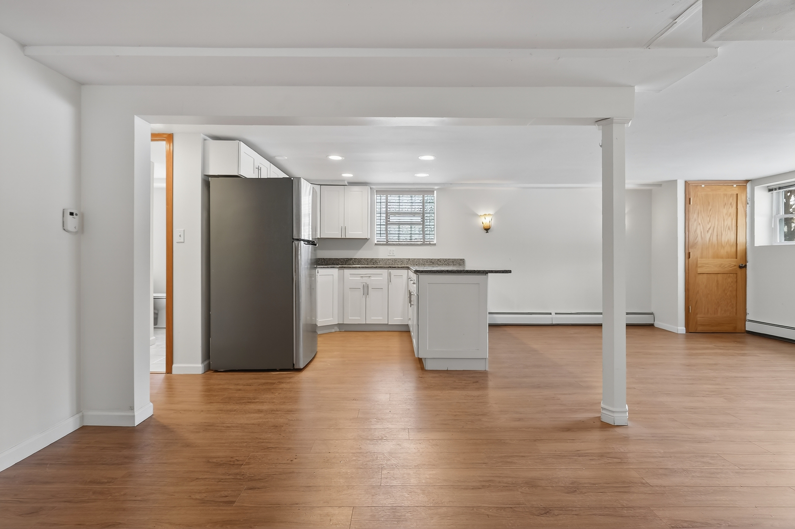 5101 North Kenton Avenue, Unit G Chicago, IL 60630 - Photo 13 of 25 a kitchen with stainless steel appliances a refrigerator and a stove top oven