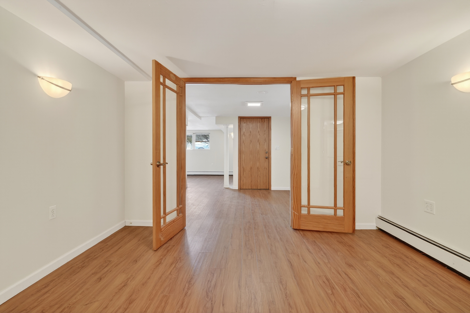 5101 North Kenton Avenue, Unit G Chicago, IL 60630 - Photo 15 of 25 a view of a room with wooden floor