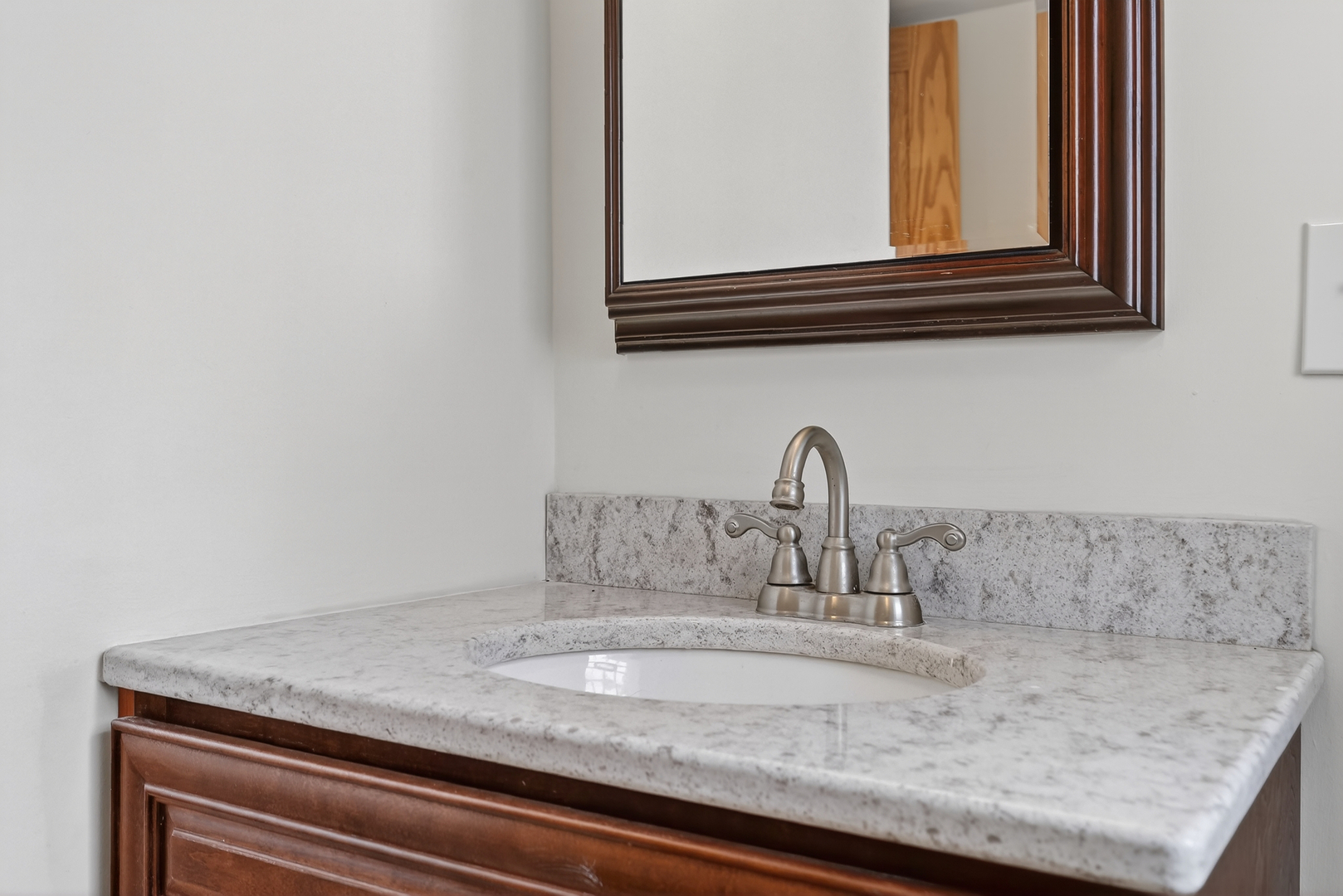 5101 North Kenton Avenue, Unit G Chicago, IL 60630 - Photo 19 of 25 a close view of sink and tap