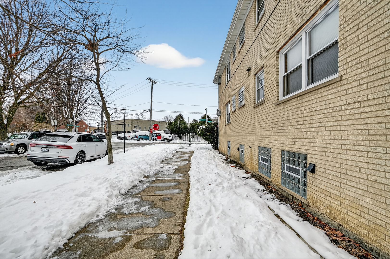 5101 North Kenton Avenue, Unit G Chicago, IL 60630 - Photo 24 of 25 a cars parked on the side of street