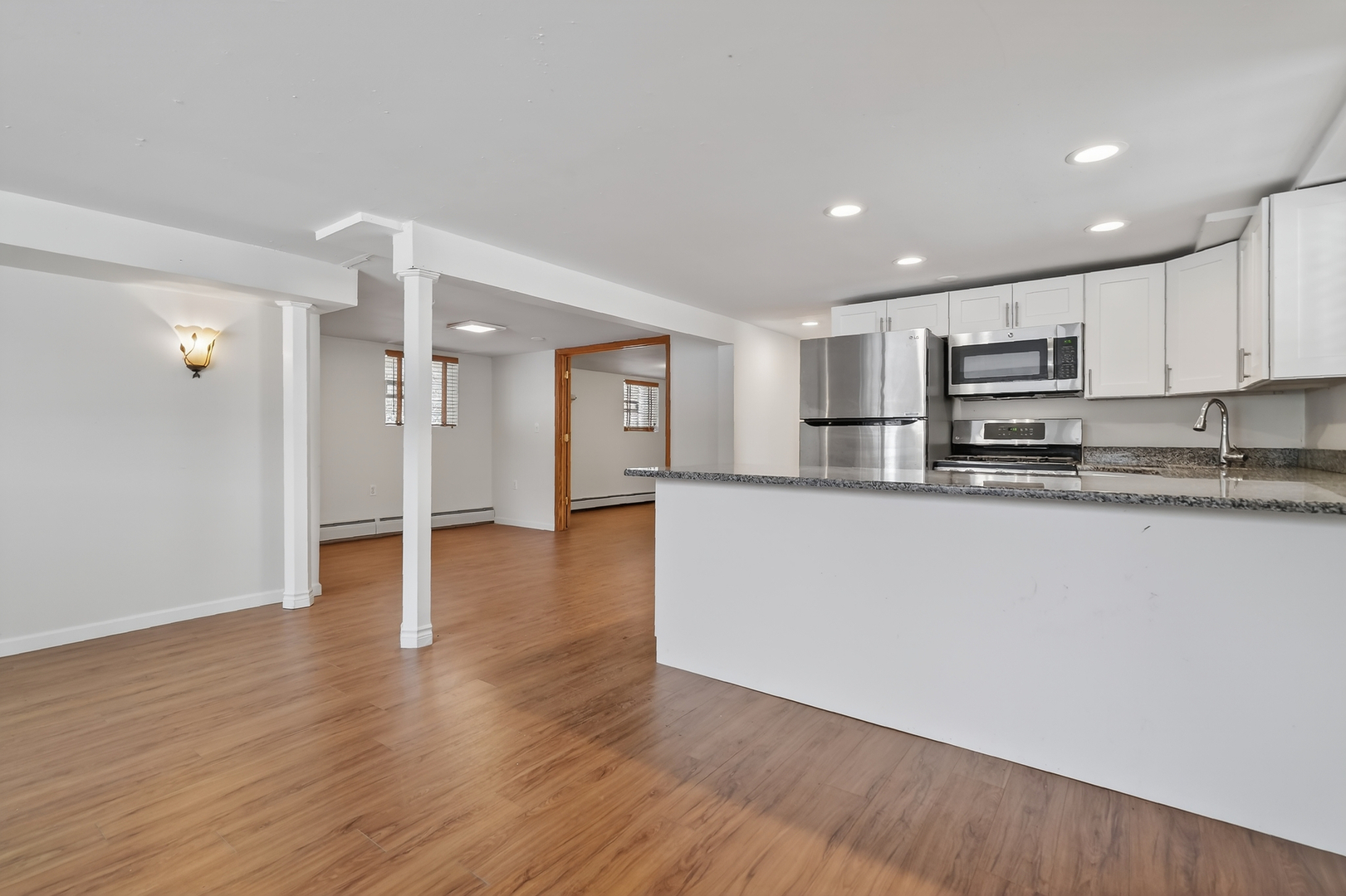 5101 North Kenton Avenue, Unit G Chicago, IL 60630 - Photo 4 of 25 a view of kitchen with stainless steel appliances granite countertop a stove a sink and a refrigerator