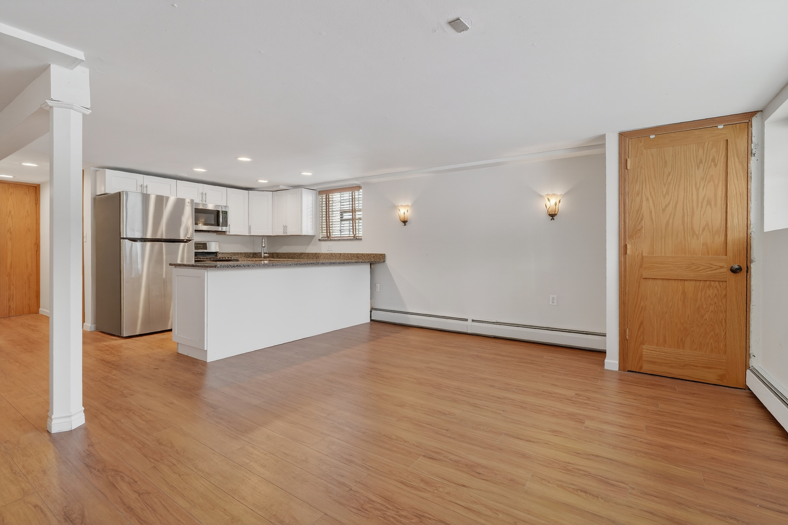 5101 North Kenton Avenue, Unit G Chicago, IL 60630 - Photo 6 of 25 a view of a kitchen with a sink and a refrigerator