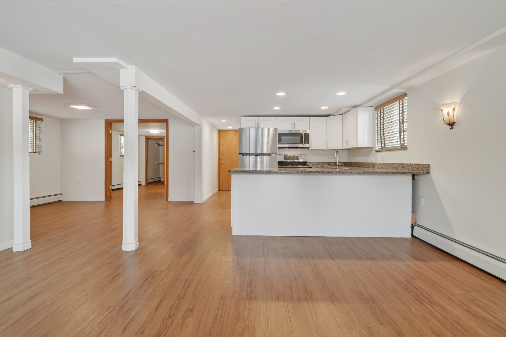 5101 North Kenton Avenue, Unit G Chicago, IL 60630 - Photo 7 of 25 a view of kitchen with wooden floor