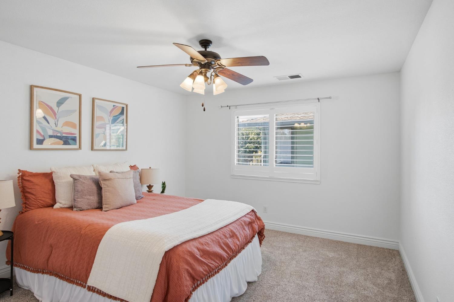 10401 Golf Link Road Turlock, CA 95380 - Photo 31 of 63 a bedroom with a large bed and a window