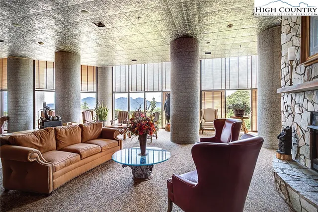 a view of a livingroom with furniture window and outside view