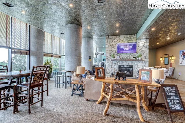 a view of a big room with lounge chair