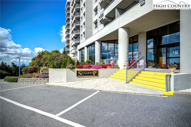 a view of a chairs and tables in patio