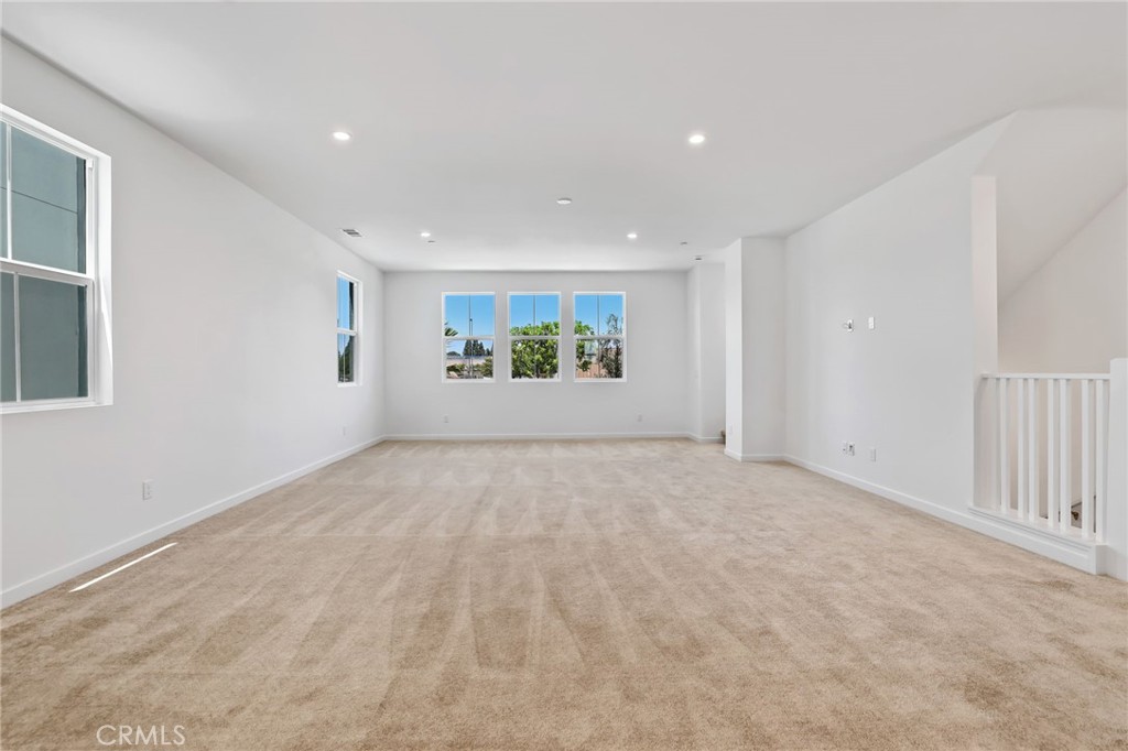 139 Jessup Way Tustin, CA 92780 - Photo 16 of 31 a view of an empty room with a window